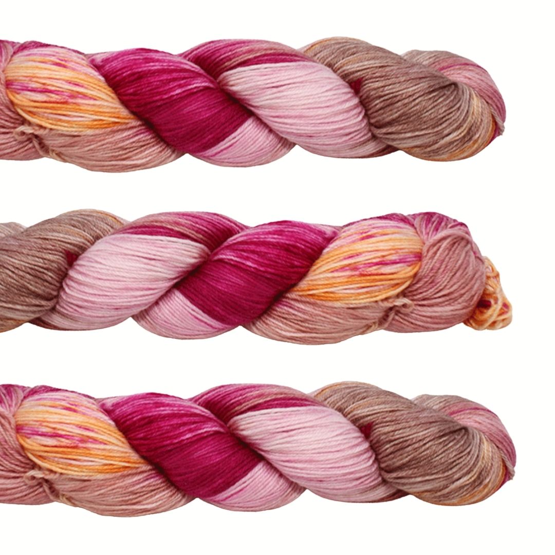 The Good Yarn Fiori Hand Dyed Sock Yarn Fuschia Haze Pinks orange brown cream merino wool
