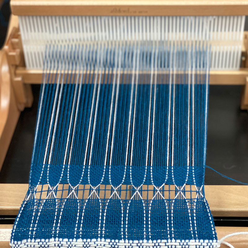 The Good Yarn Leno Lace Weaving with blue thread on The Rigid Heddle Weaving Loom