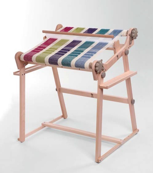 The Good Yarn Rigid Heddle Loom and Stand with bright coloured weaving cottons 