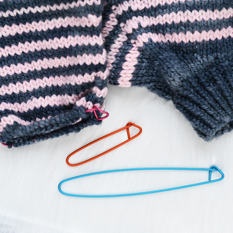 The Good Yarn Knitpro aluminium stitch holder in knitting jumper